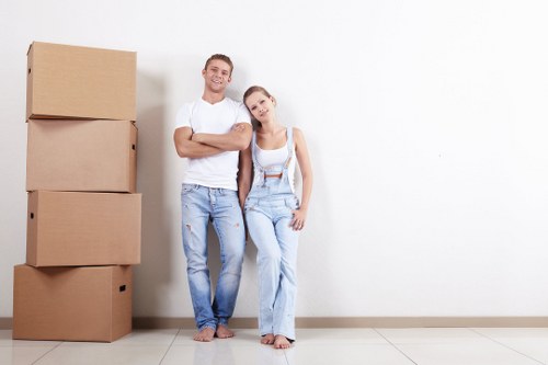 Moving team loading household items for a UK relocation service