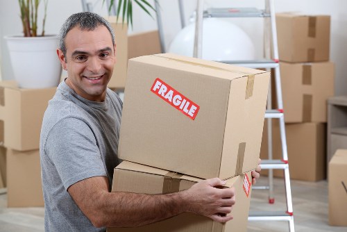 Local office removals planning in Brent with desks and boxes prepared for transport