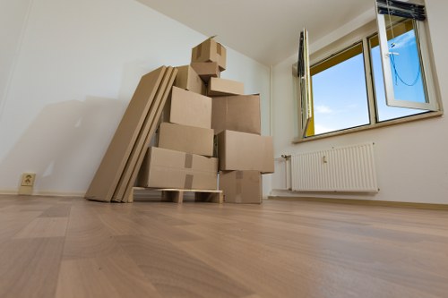 Removal team assisting a home move in Brent with boxes and furniture