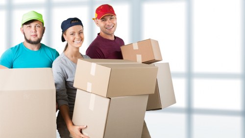 Packed student boxes and furniture ready for a move