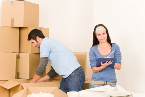Careful loading of household items for a Brent relocation
